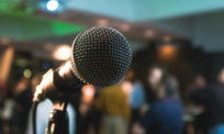 silver corded microphone in shallow focus photography