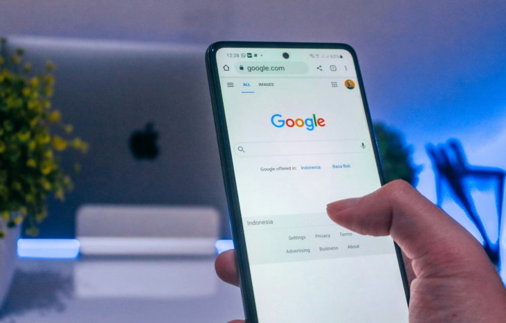 person holding white android smartphone